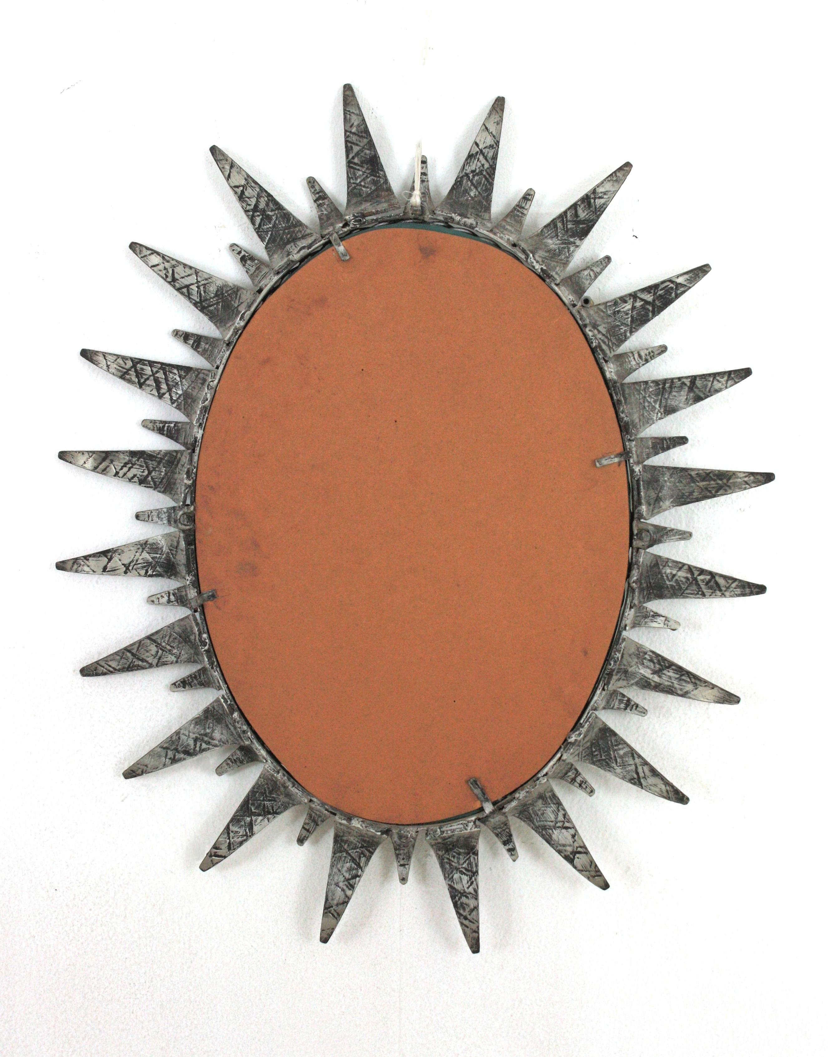 Sunburst Oval Mirror in Silver Patinated Iron For Sale 5
