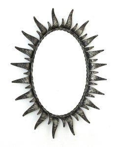 Oval Sunburst Mirror in Silver Patinated Wrought Iron, 1950s