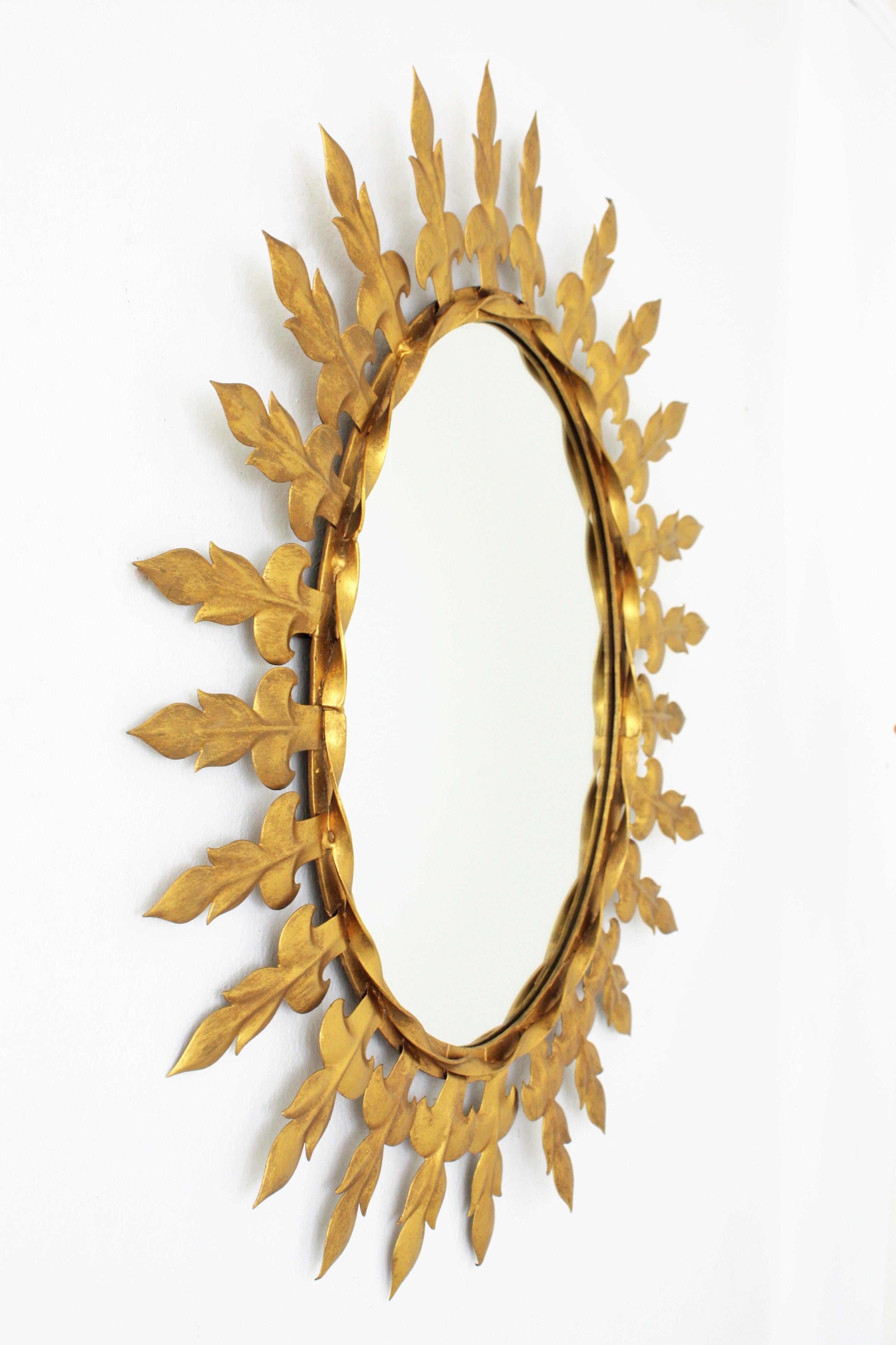 Mid-Century Modern Spanish Sunburst Mirror in Gilt Metal For Sale