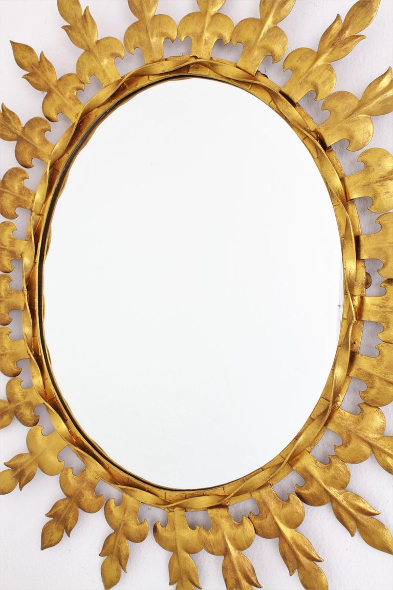 Sunburst Oval Mirror in Gilt Metal For Sale at 1stDibs