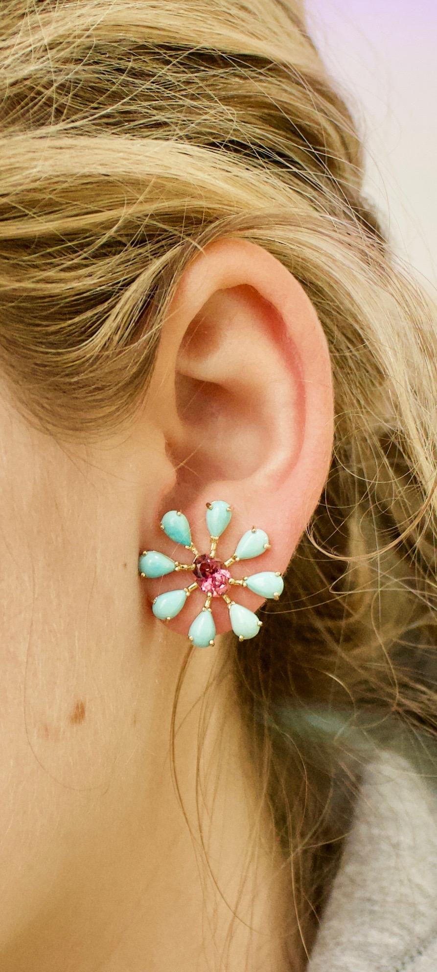 Sunburst Pink Tourmaline and Persian Turquoise Earrings in 18k Yellow Gold
Two Oval Pink Tourmalines Weigh 2.50 Carats Approximately   
16 Persian Turquoises 5 x 3 mm
Exclusively Designed For Jewels of Wailea  