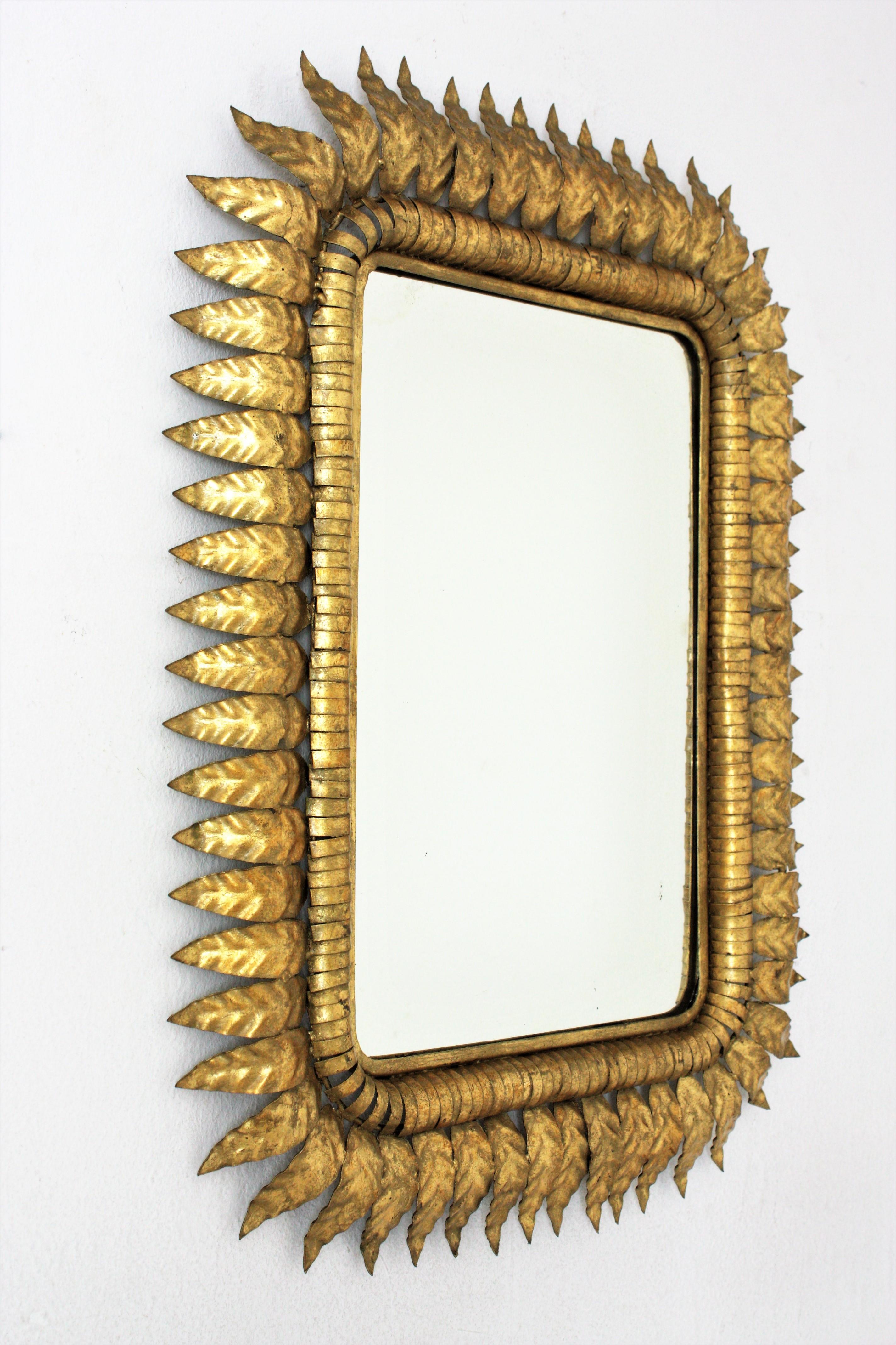 Mid-Century Modern Sunburst Rectangular Mirror in Gilt Iron, Hollywood Regency  For Sale