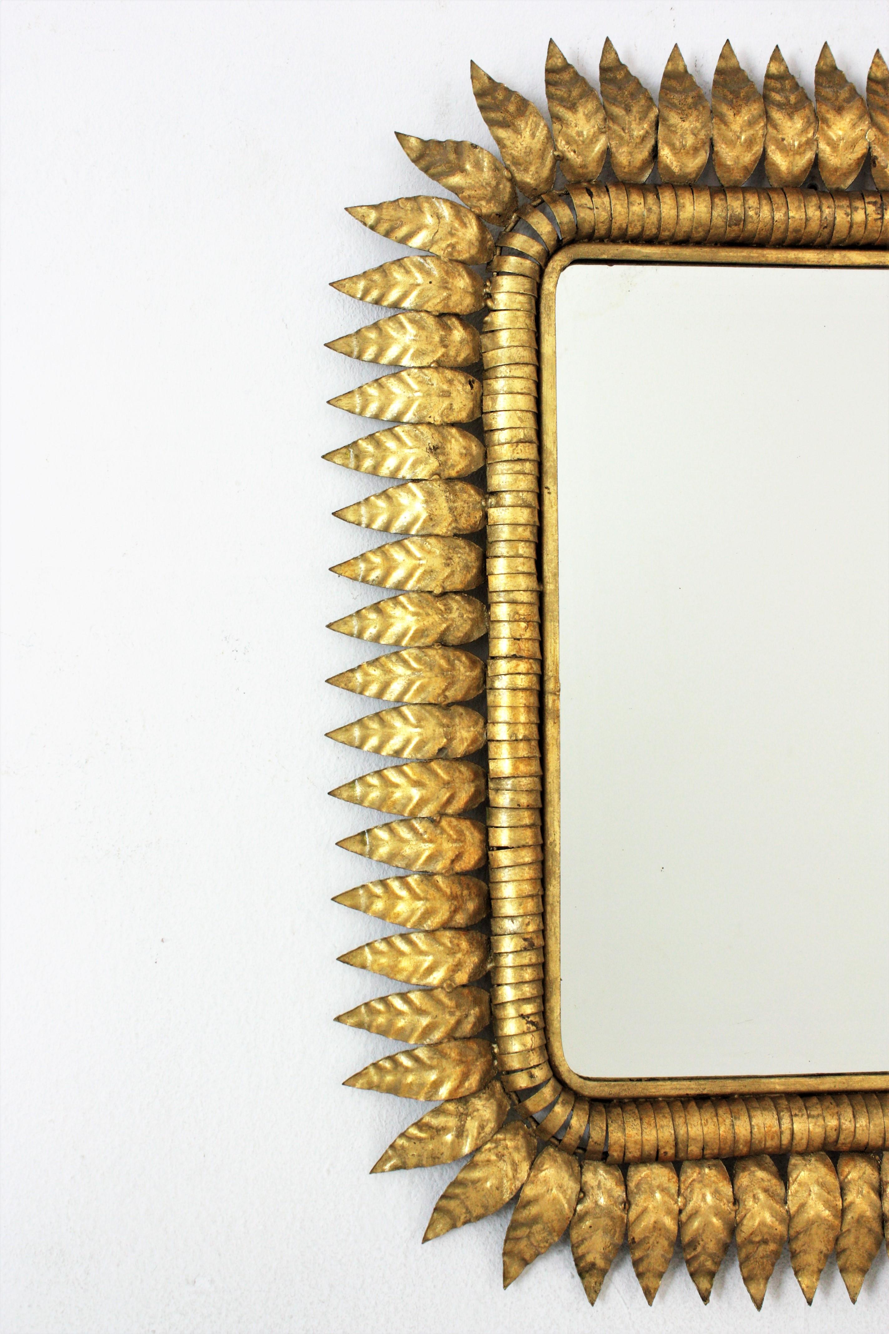 Spanish Sunburst Rectangular Mirror in Gilt Iron, Hollywood Regency  For Sale
