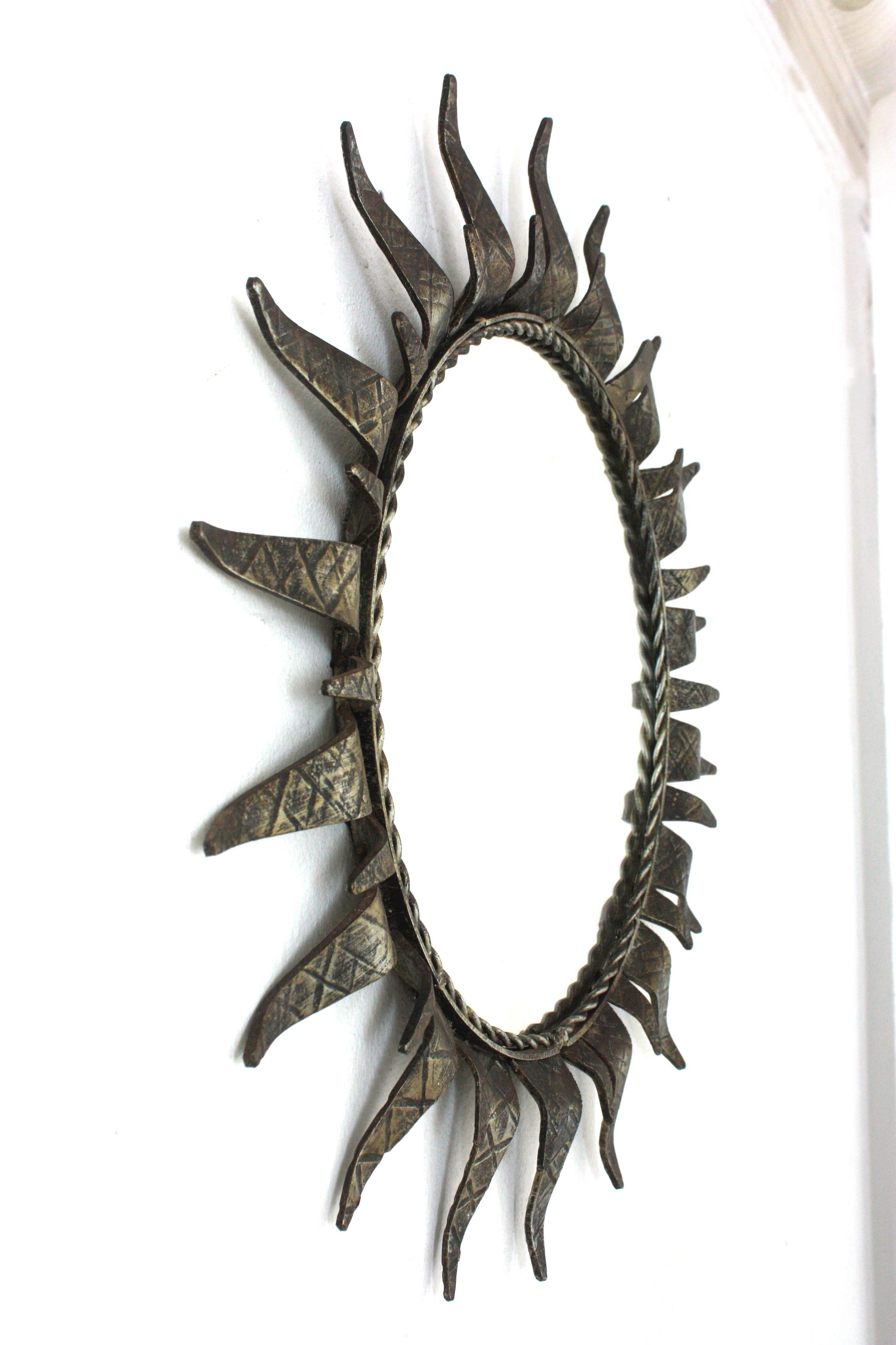 Spanish Sunburst Mirror in Silvered Wrought Iron, 1950s In Good Condition For Sale In Barcelona, ES