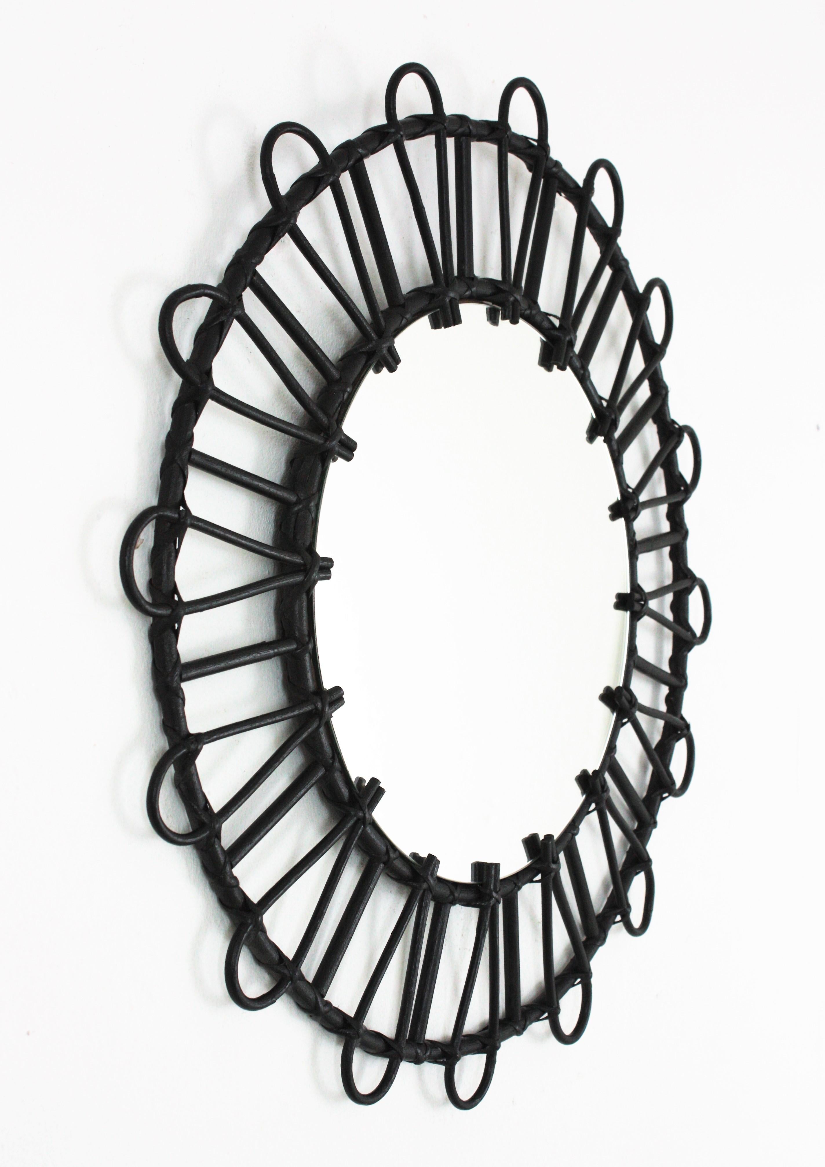black and rattan mirror