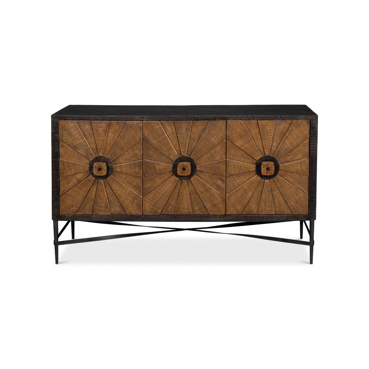 Crafted from reclaimed wood, each door features an intricate sunburst pattern that radiates warmth and texture, while the deep black frame enhances its sculptural presence. The sideboard is supported by a sleek, crisscross metal base, adding an