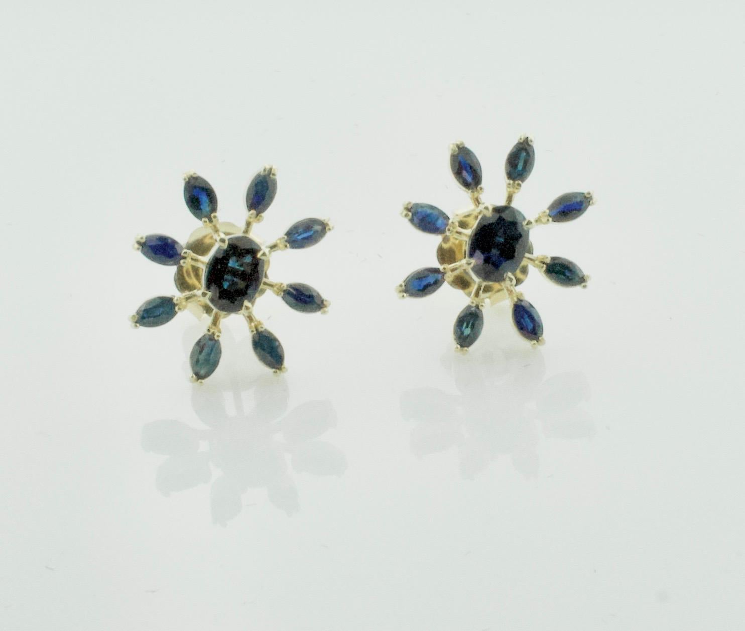 Oval Cut Sunburst Sapphire Earrings in 18 Karat Yellow Gold For Sale