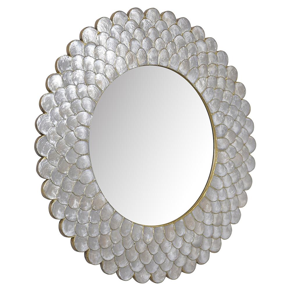 A fabulous sunbursts shell mirror is in great condition and features great handcrafted details gilt accents and a round mirror that is fully reflective. This elegant mirror is ready to be used and displayed for years to come.
Size: Mirror 20.5'