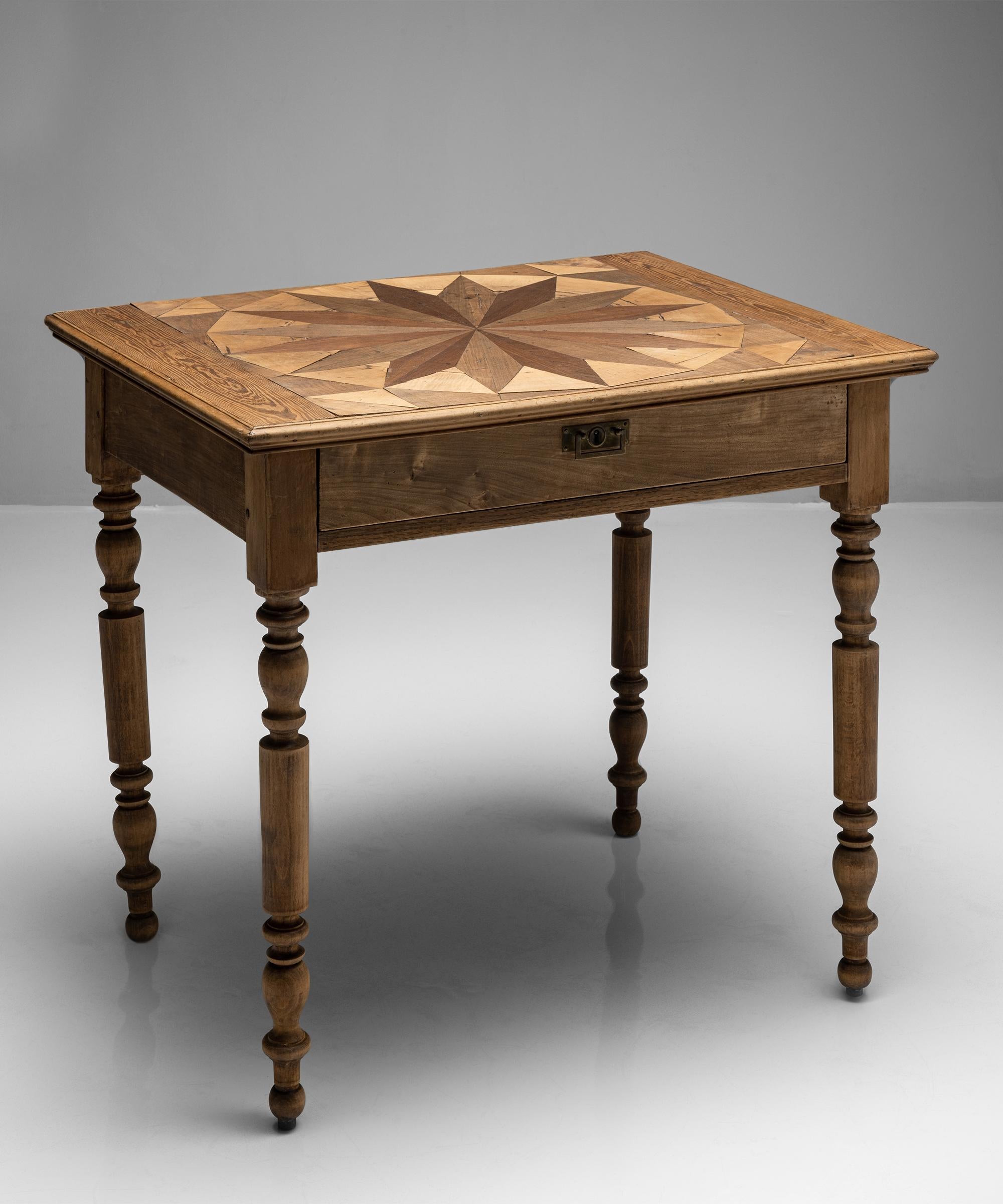 Sunburst side table

France circa 1880

Top is inlaid with various specimens of wood in the shape of a sunburst. with single drawer.

Measures: 32.5” W x 25.5” D x 29” H.

$ 4,800.

 