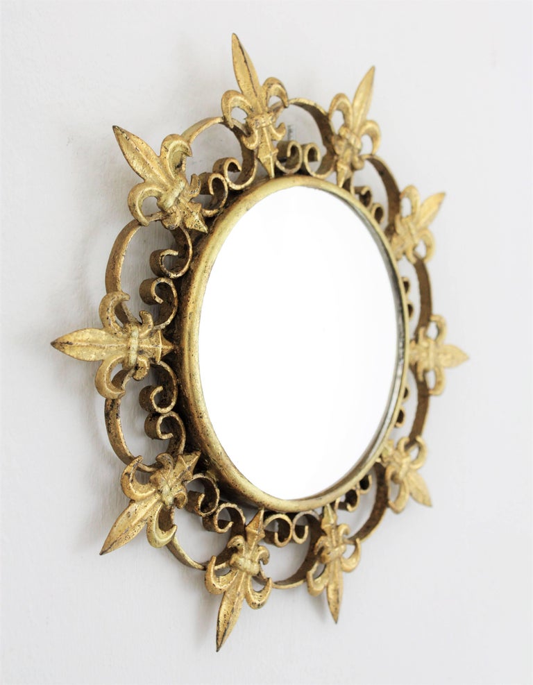Sunburst Small Scale Gilt Metal Mirror with FleurdeLys Design For