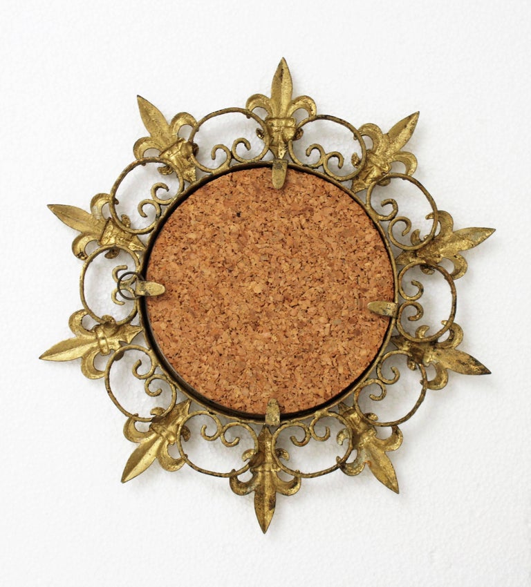 Sunburst Small Scale Mirror in Gilt Iron with FleurdeLys Design For