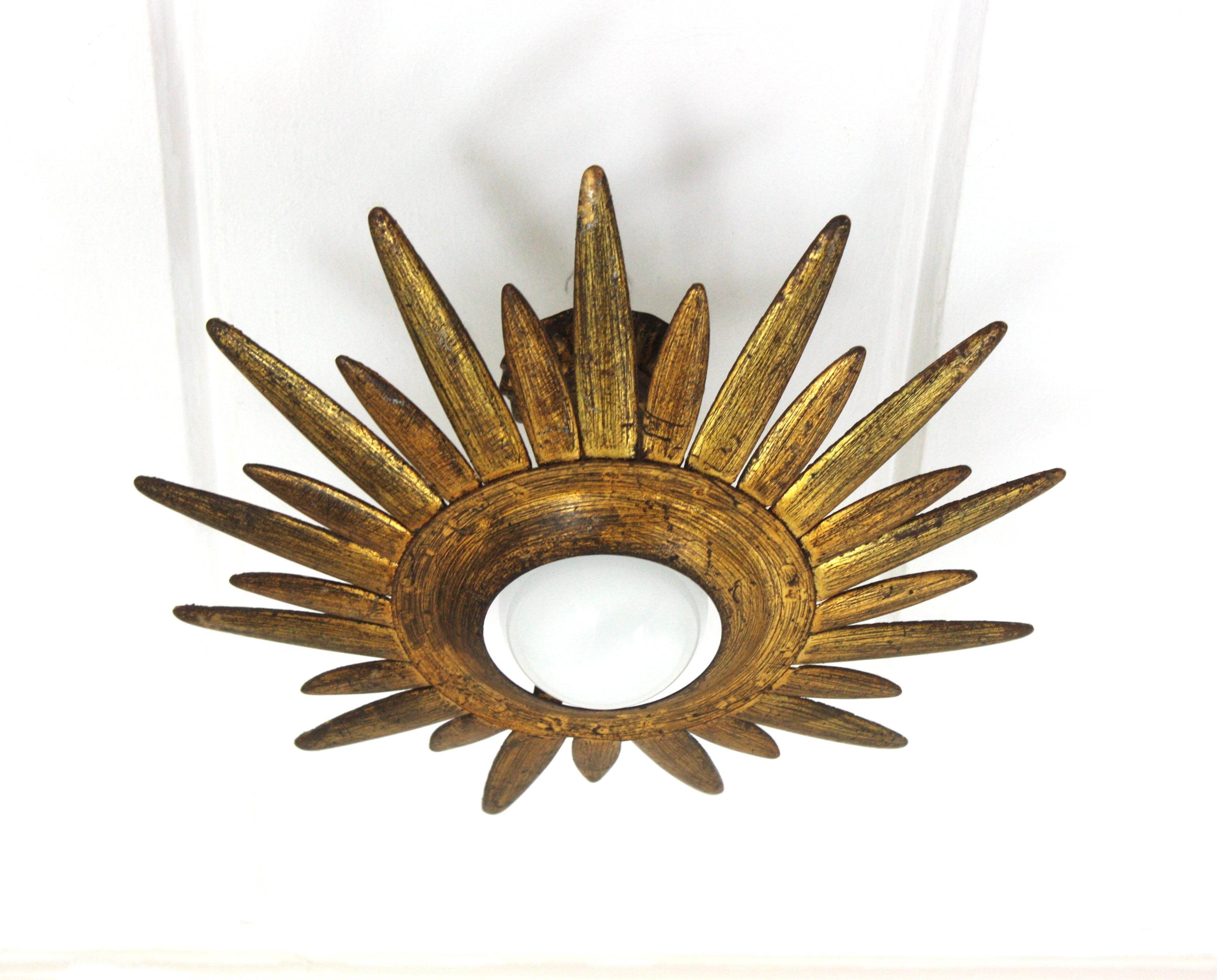Spanish Sunburst Starburst Light Fixture in Gilt and Green Metal For Sale
