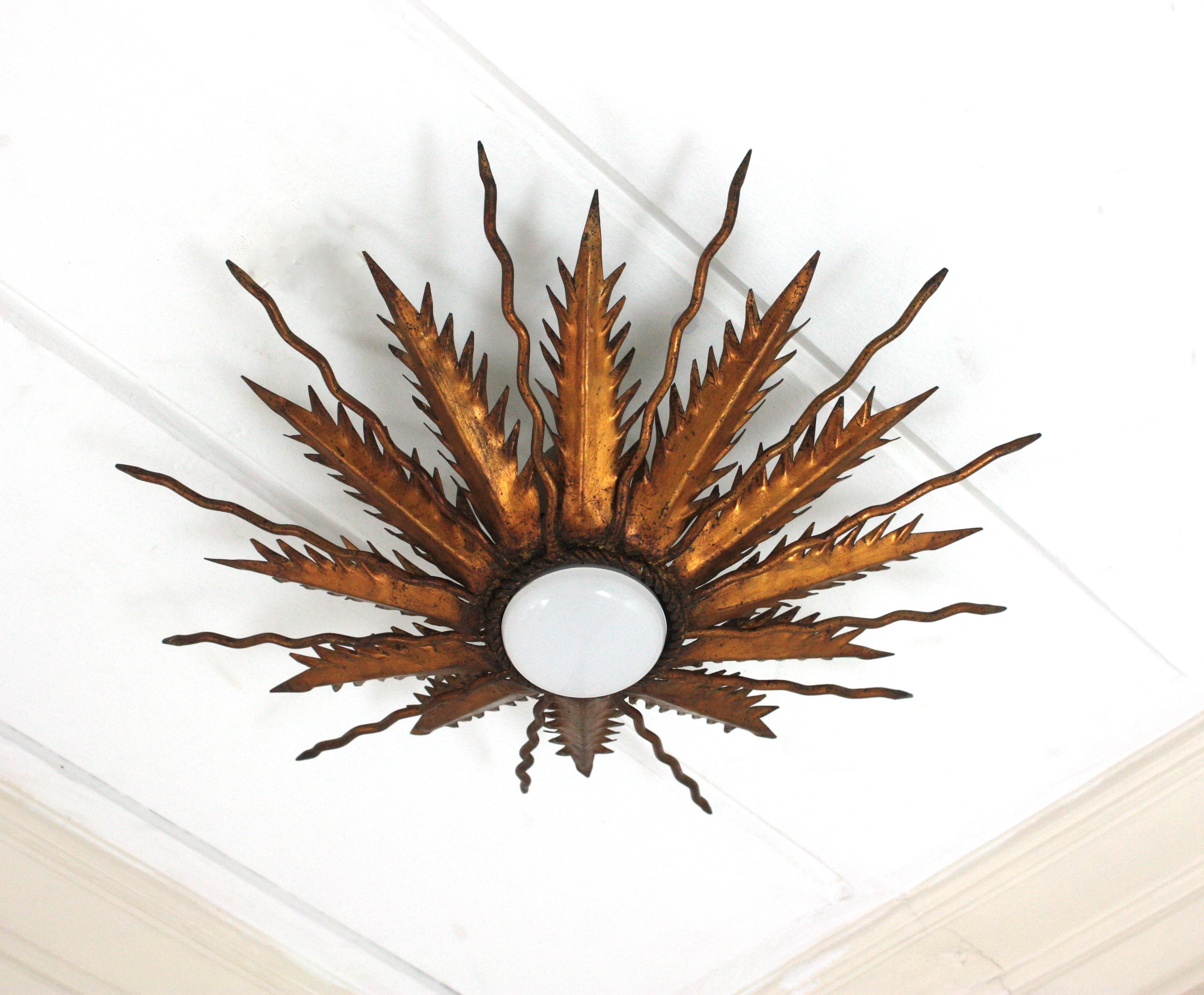 Brutalist Sunburst Starburst Light Fixure in Bronze Gilt Wrought Iron, 1950 For Sale
