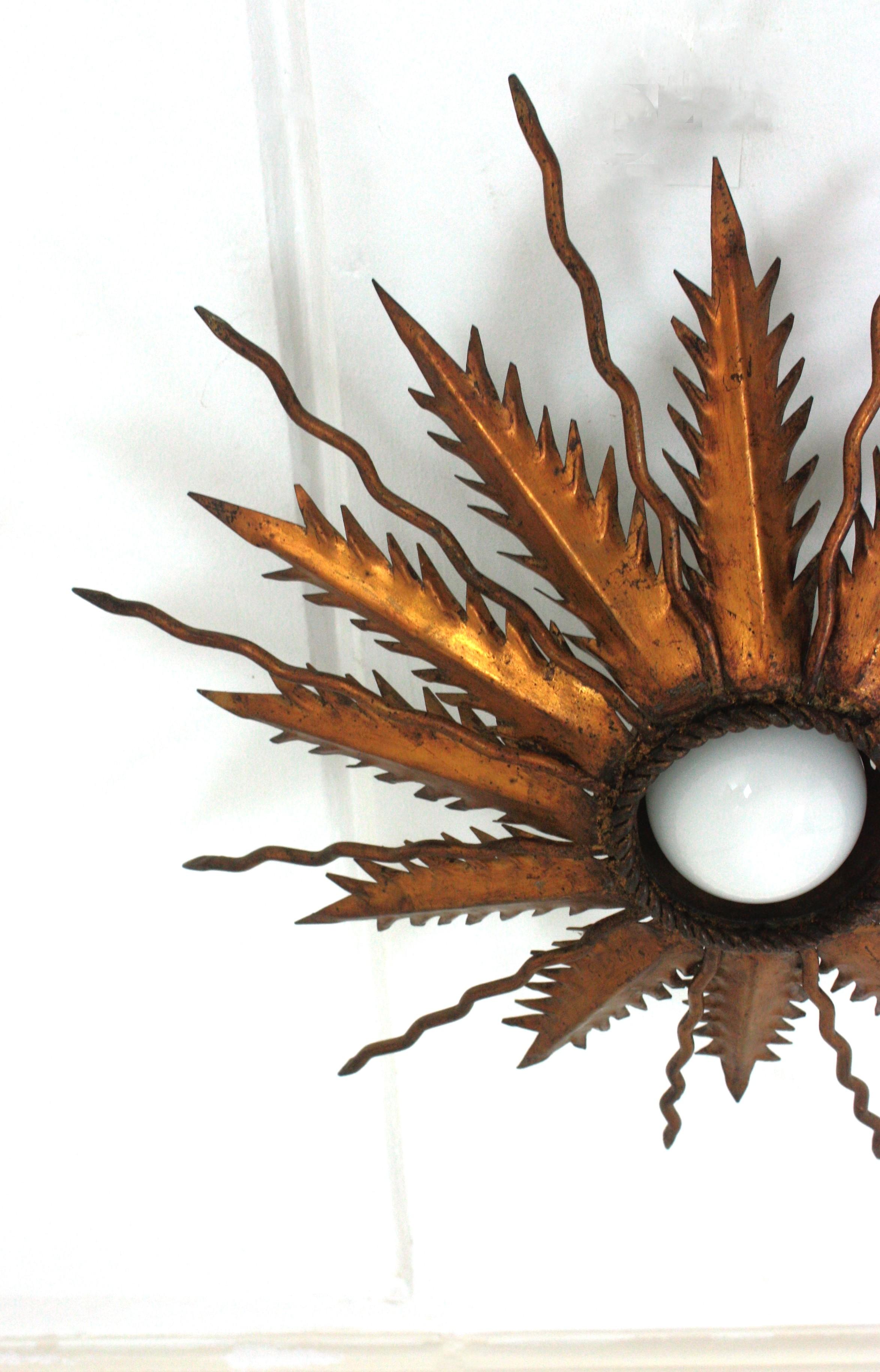 20th Century Sunburst Starburst Light Fixure in Bronze Gilt Wrought Iron, 1950 For Sale