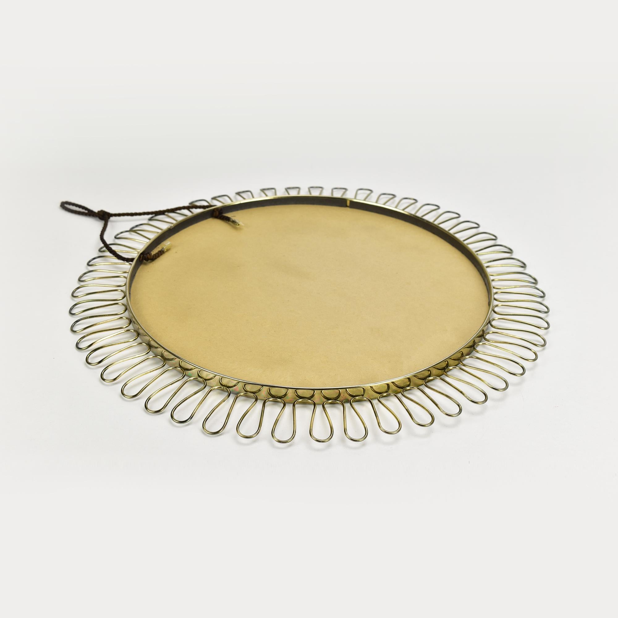 Swedish Sunburst Wall Brass Loop Mirror by Josef Frank for Svenskt Tenn Sweden, 1950s For Sale