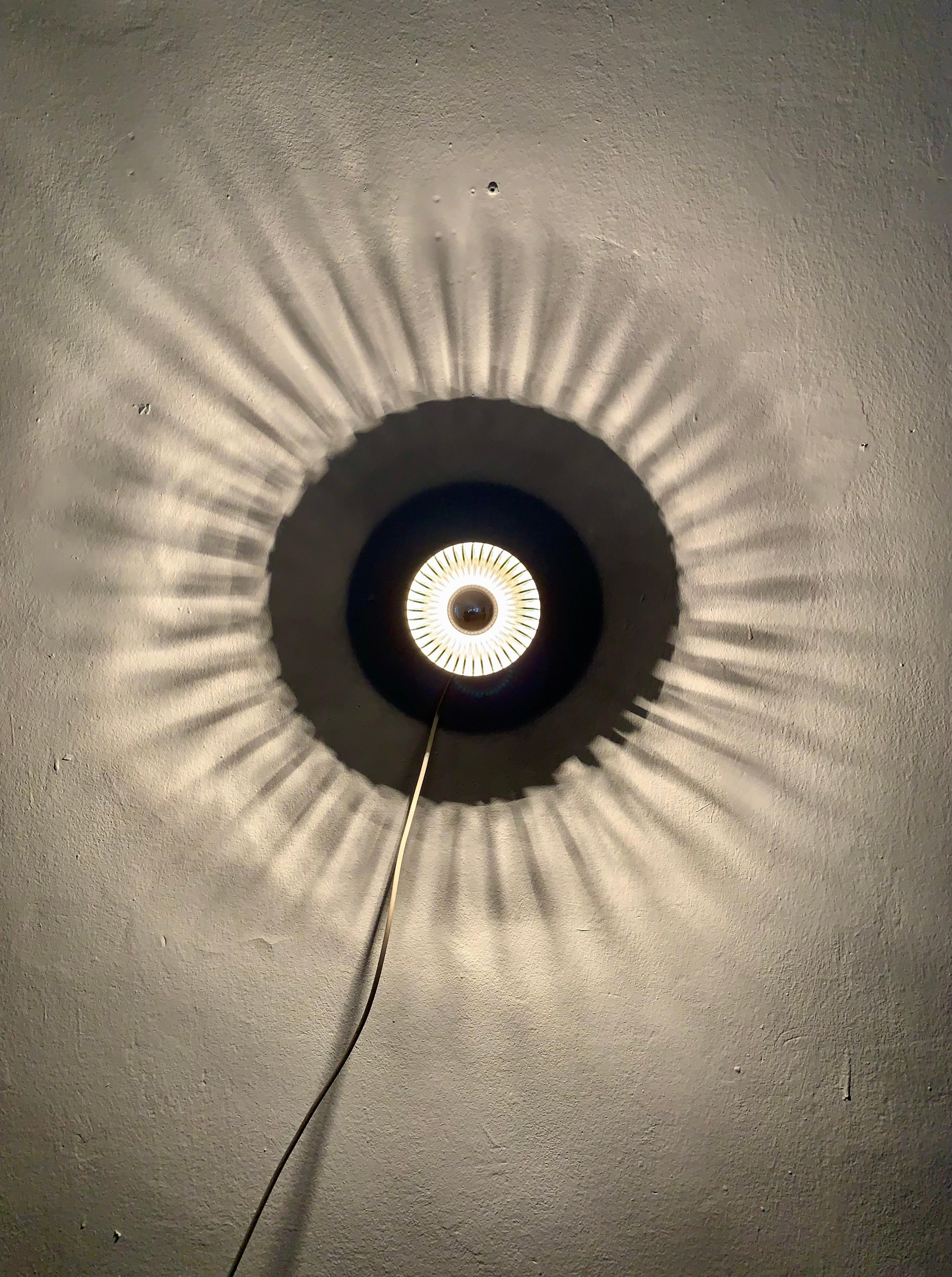 Metal Sunburst wall lamp For Sale