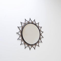 Sunburst wall mirror in iron with heart motif - 1960s