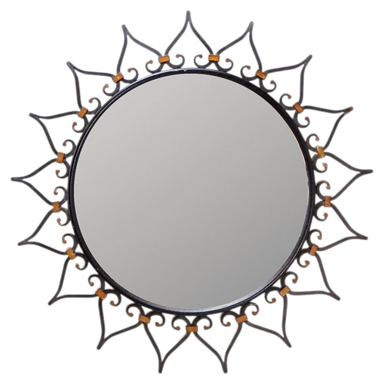 Sunburst wall mirror in iron with heart motif - 1960s For Sale