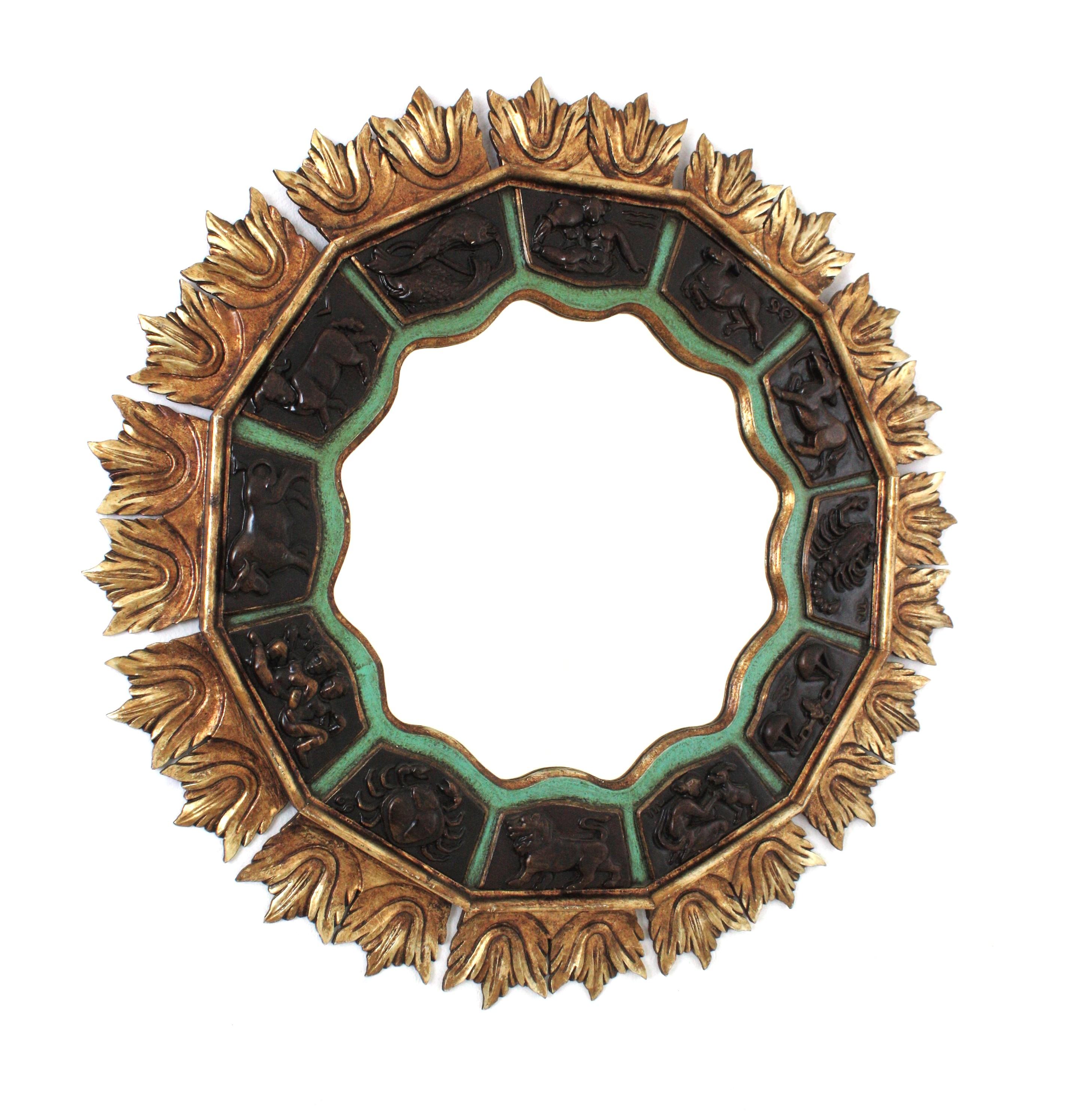 Large Midcentury Zodiac Mirror / Sunburst Mirror (35,43 in )
One of a kind polychrome wood zodiac XL sunburst mirror, Spain, 1950s
Large giltwood sunburst mirror featuring 12 carved horoscope signs around the frame. 
An scalloped gold leaf gilded