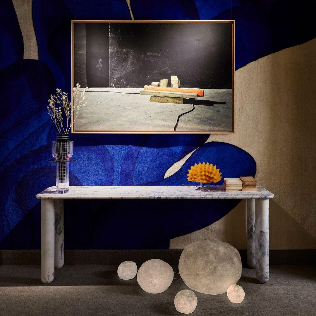 Sunday is a family of tables, consoles and desks with a simple and clean design vocabulary. The combination of heavy marble legs with the thin solid wood or marble top creates an interesting contrast while the rounded edges and generous proportions