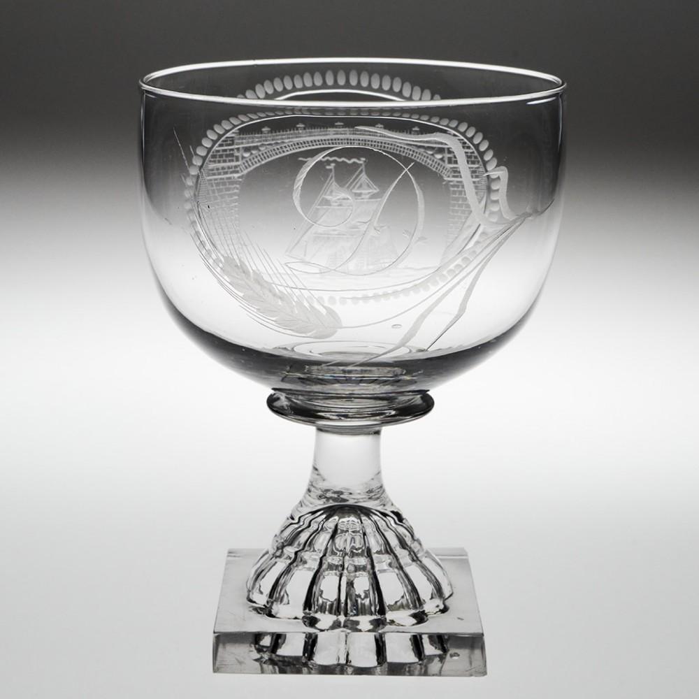 Sunderland Bridge Rummer with Lemon Squeezer Foot, c1800

Additional information: 
Period : George III
Origin : England
Colour : Clear, good grey tone
Bowl : Cup shaped over a bladed collar knop; engraved with an image of a two-masted brig sailing