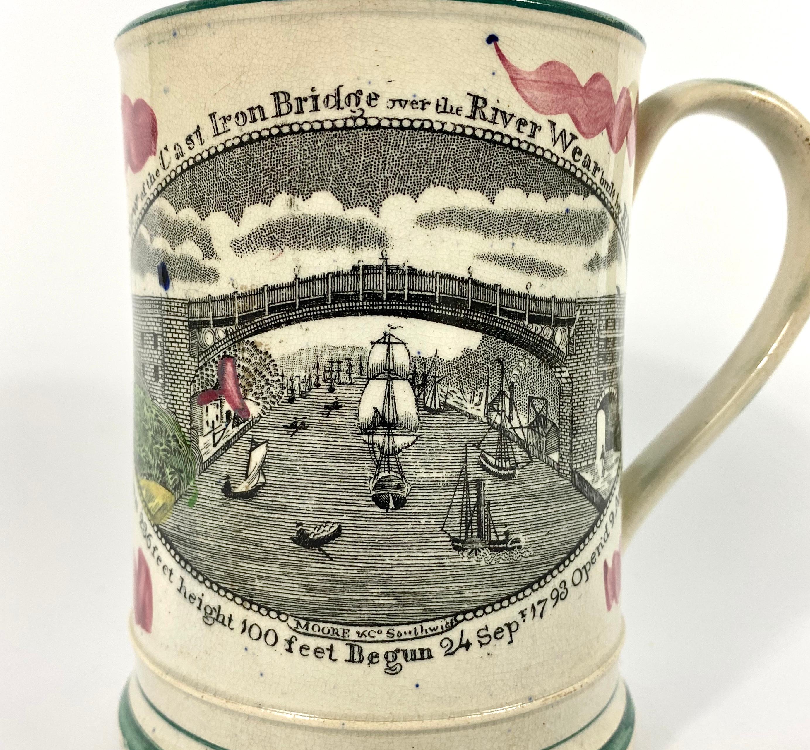 Sunderland pottery ‘Frog’ mug, Moore & Co. Pottery, circa 1820. Printed to one side, in black, and hand colored, with ‘A East View of the Cast Iron Bridge over The River Wear, built by R. Burdon, MP’. The reverse, with a verse, within a floral