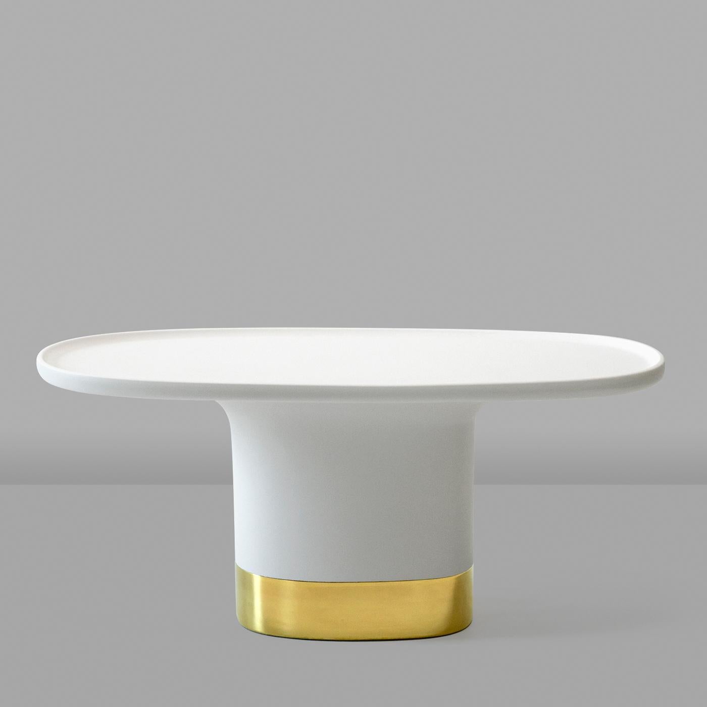 This coffee table makes for a striking pedestal for display beside a sofa or armchair in both residential and commercial interiors. Designed by Matteo Zorzenoni, Sune is crafted entirely of ceramic with a crisp white glossy finish that enhances its