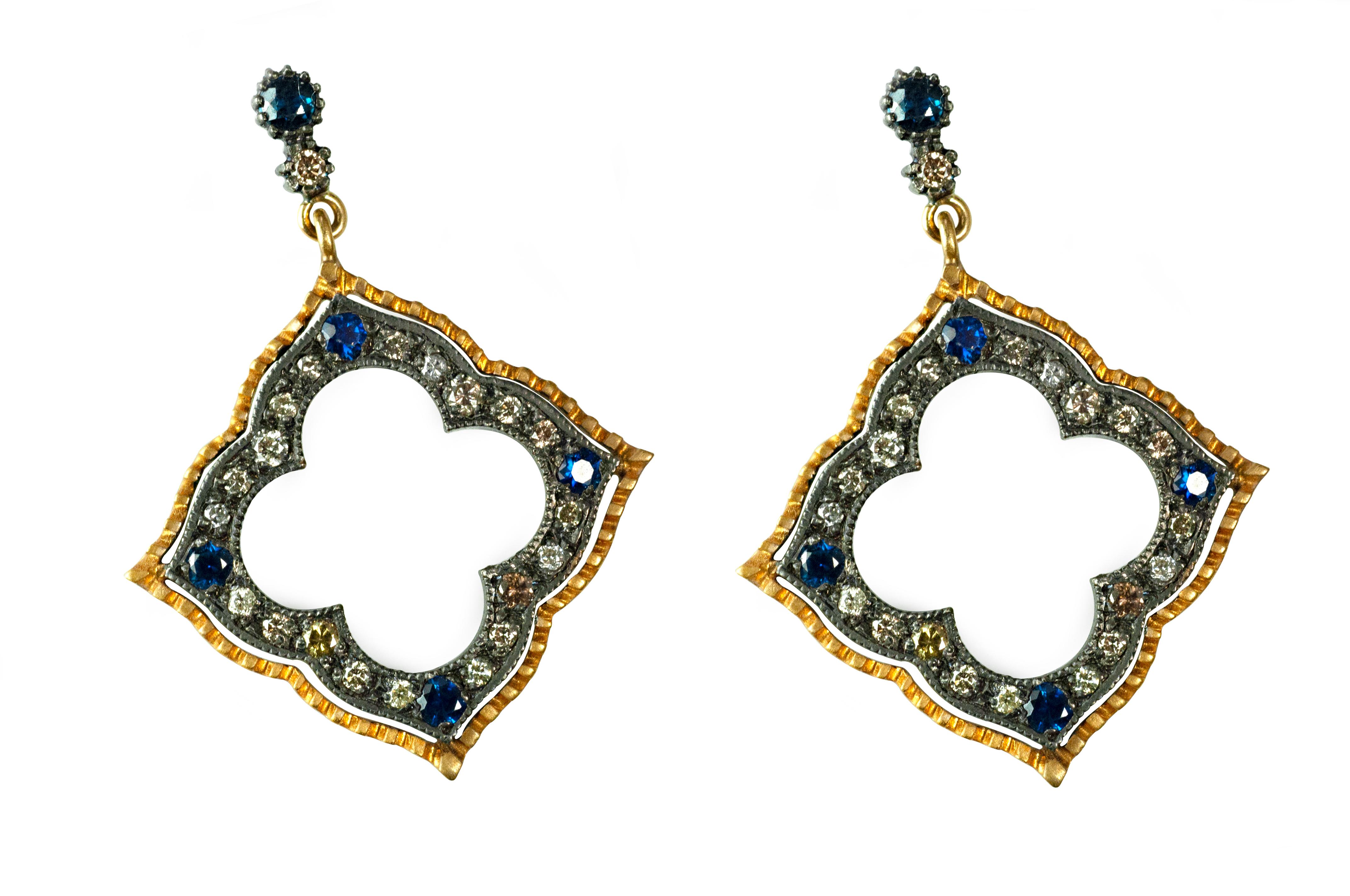 Blue sapphire 0.42cts with blackened silver and 18K Yellow Gold with pave diamonds 0.68cts.