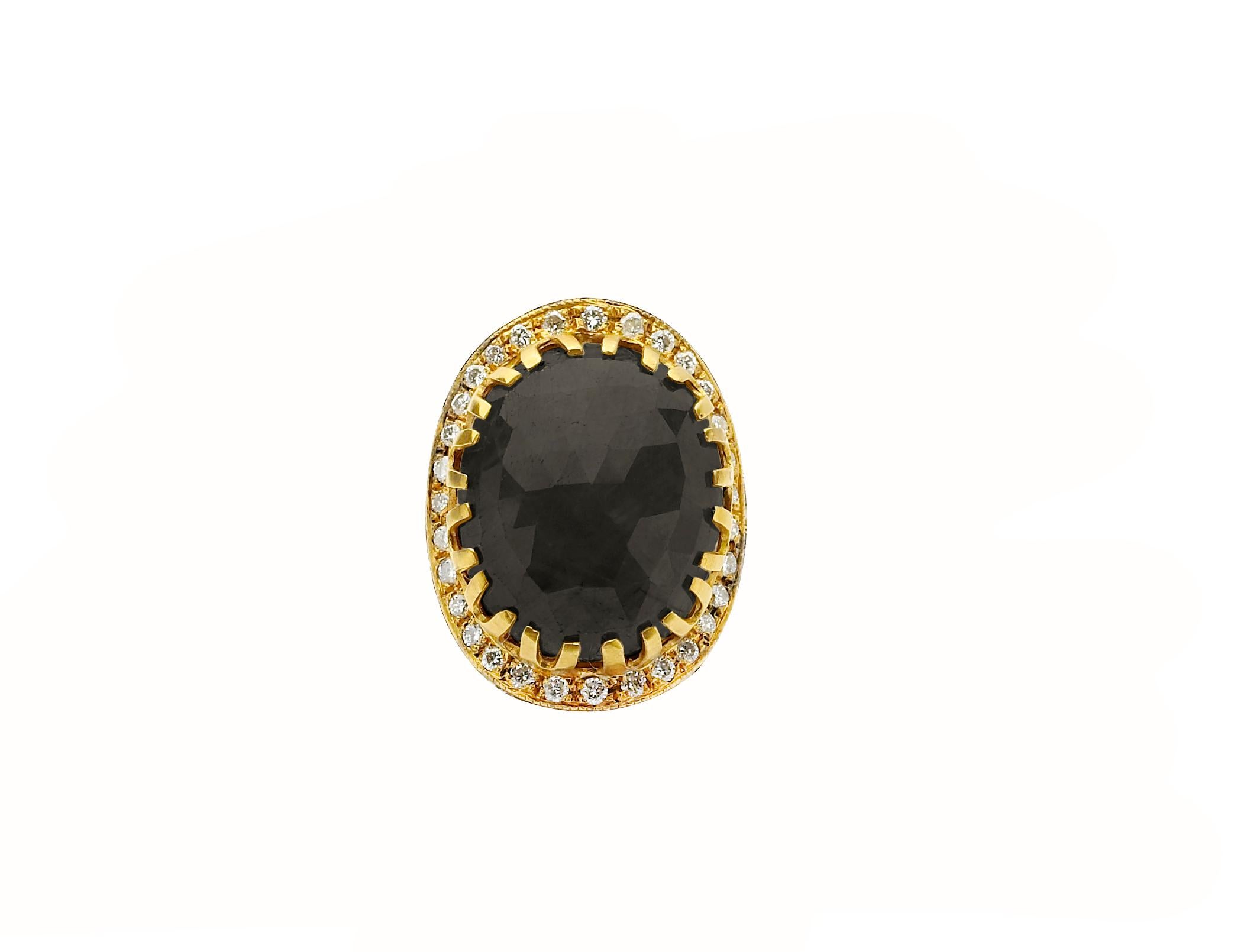 Faceted Chocolate Sapphire 9.89cts with 18K yellow gold and pave diamonds 0.80cts. Size 6.75.

Chocolate Sapphire is a brown variety of sapphire. Smooth, warm and satisfying, this stone is a fun way to introduce a surprising neutral tone in your