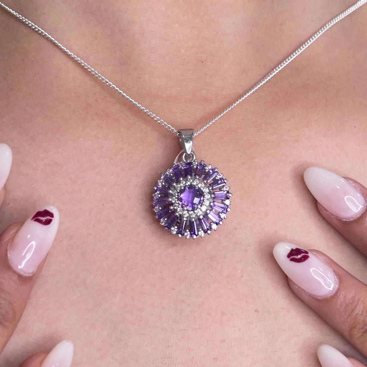 Sunflower Amethyst Round Shape Pendant in sterling silver studded with round cut amethyst. This stunning piece of jewelry instantly elevates a casual look or dressy outfit.
Amethyst enhances the intellectual capacity of the person.
Designed with