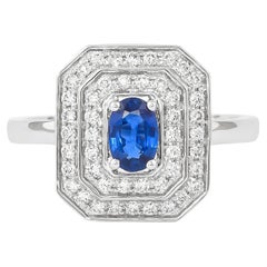 Zaffiro blu Sunita Nahata 0.48ct. Anello in 18KWG con diamante.