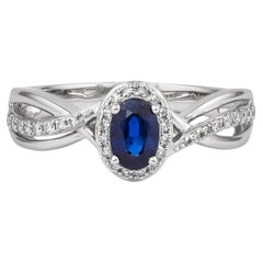 Zaffiro blu Sunita Nahata 0.55ct. Anello fantasia con diamante in 18KWG.