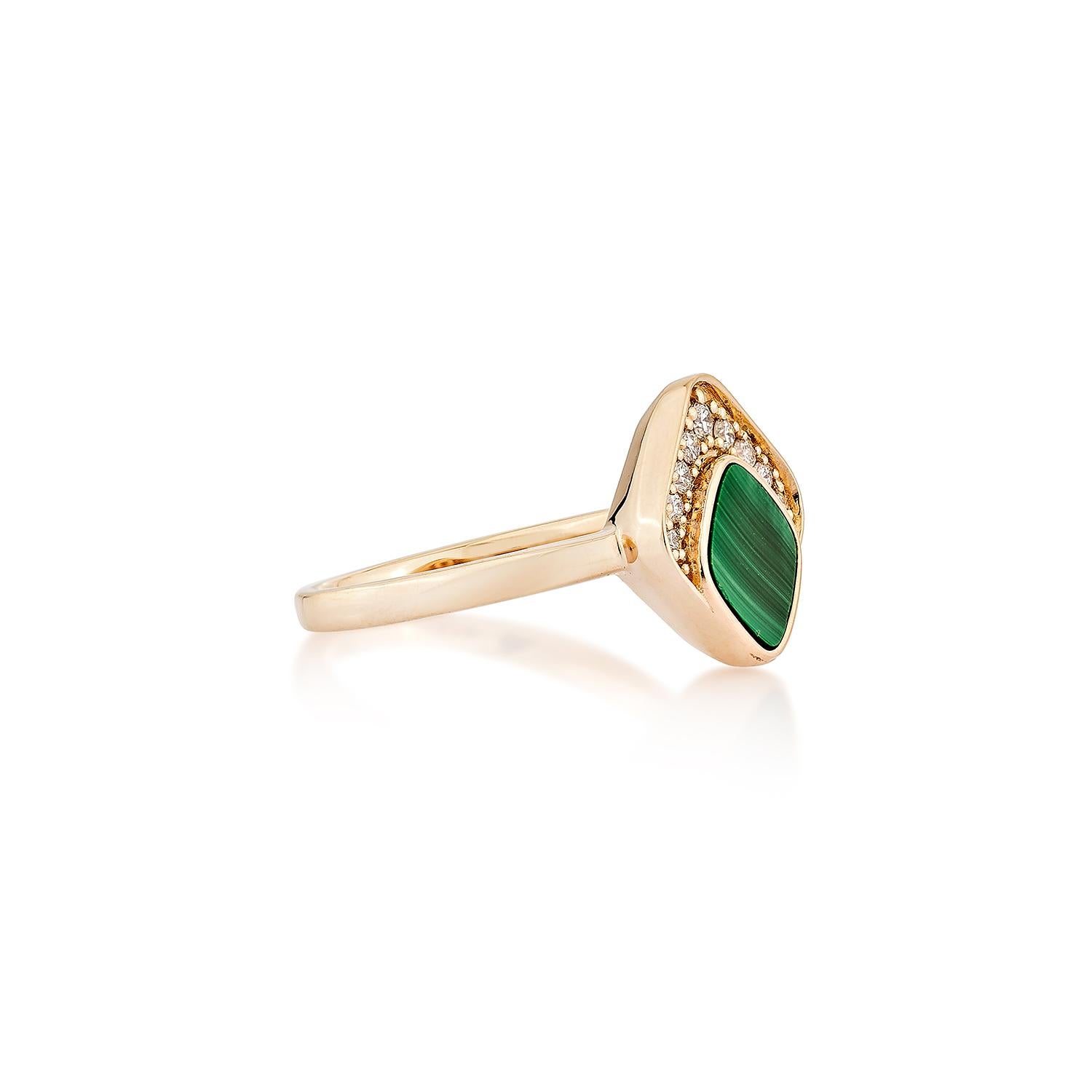 This Malachite Ring is a stunning piece featuring a cushion-shaped, brilliant green malachite gemstone framed by a halo of glittering diamonds. The diamonds add a radiant shine and enhance the natural beauty of the ring, creating a tasteful