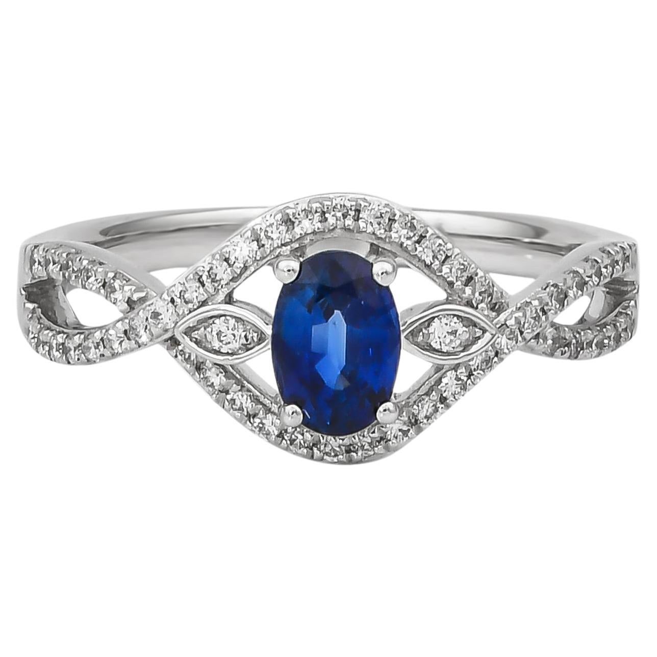 Zaffiro blu Sunita Nahata 0.70ct. Anello in 18KWG con diamante.