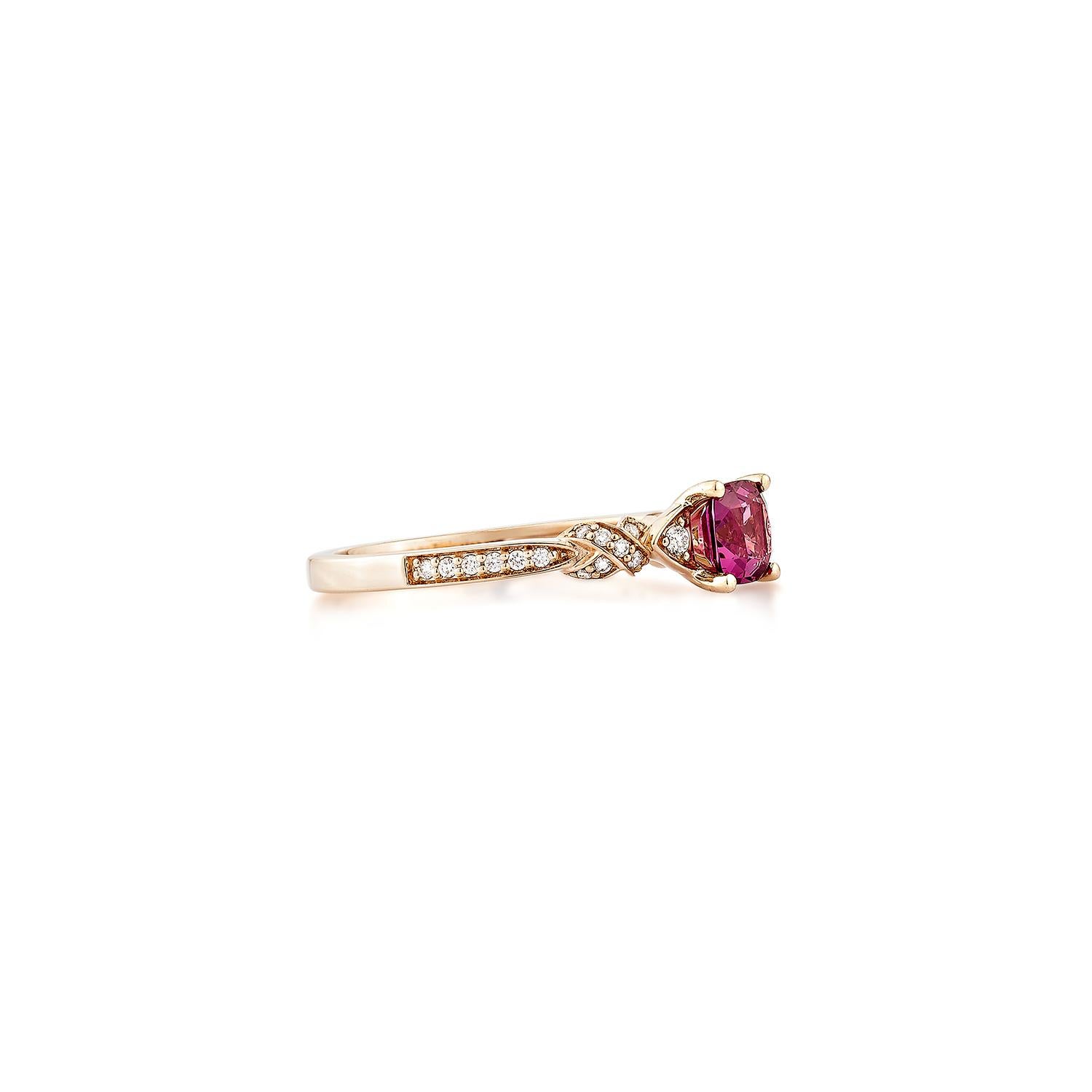 Sunita Nahata presents an elegant Rhodolite fancy ring in an cushion shape, set with sparkling white diamonds. This exquisite piece exudes grace and elegance, making it perfect for both daily wear and special occasions. Crafted from 14-karat rose