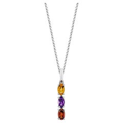 Sunita Nahata Citrin, Amethyst & Granat 0,77 Karat. Anhänger in 14KWG.