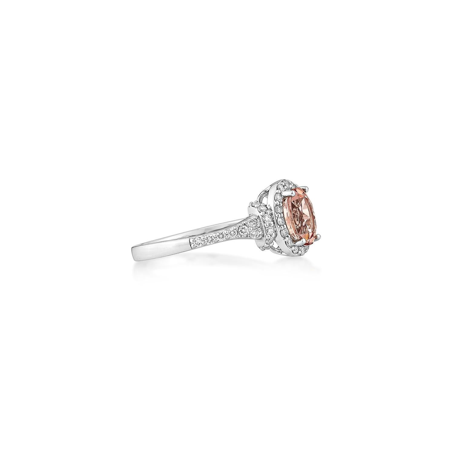 This collection includes a range of Pink Morganite, which is a symbol of love and relationships, making it an excellent choice for a variety of applications. Accented with White Diamond this ring is made in White Gold and present a classic yet