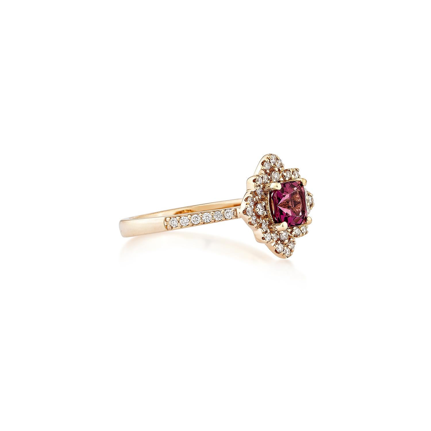 Sunita Nahata presents an elegant Rhodolite fancy ring in an cushion shape, set with sparkling white diamonds. This exquisite piece exudes grace and elegance, making it perfect for both daily wear and special occasions. Crafted from 14-karat rose
