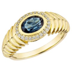 Sunita Nahata London Blue Topaz 0.85ct. Fancy Ring in 18KYG With Diamond.