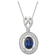 Sunita Nahata Zafiro azul 0.90ct. Colgante  en 18KWG con Diamante.