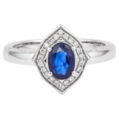 Zaffiro blu Sunita Nahata 0.91ct. Anello in 18KWG con diamante.