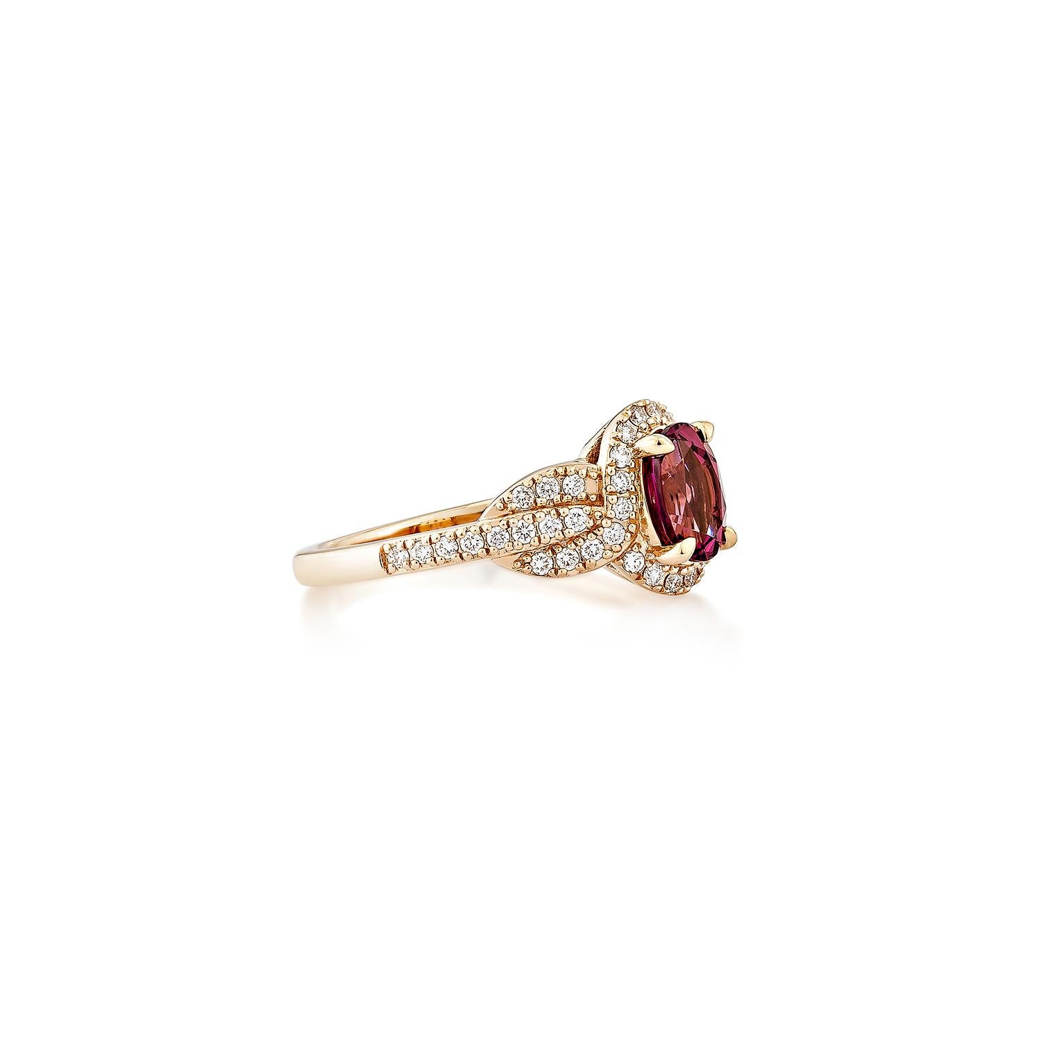 Sunita Nahata showcases an elegant Rhodolite fancy ring in an oval shape, adorned with sparkling white diamonds. This exquisite piece exudes grace and elegance, making it perfect for both daily wear and special occasions. Crafted from 14-karat rose