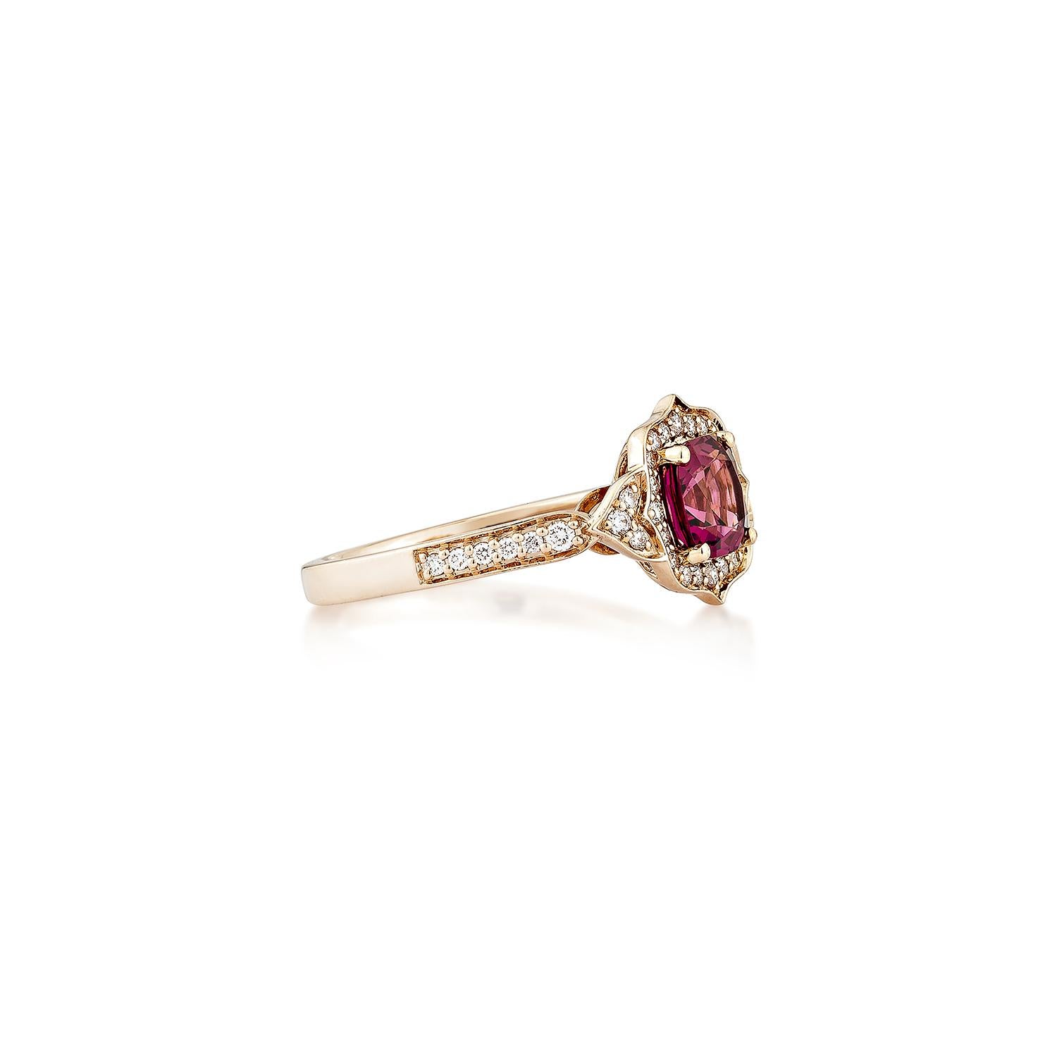 Sunita Nahata presents an elegant Rhodolite fancy ring in an cushion shape, set with sparkling white diamonds. This exquisite piece exudes grace and elegance, making it perfect for both daily wear and special occasions. Crafted from 14-karat rose