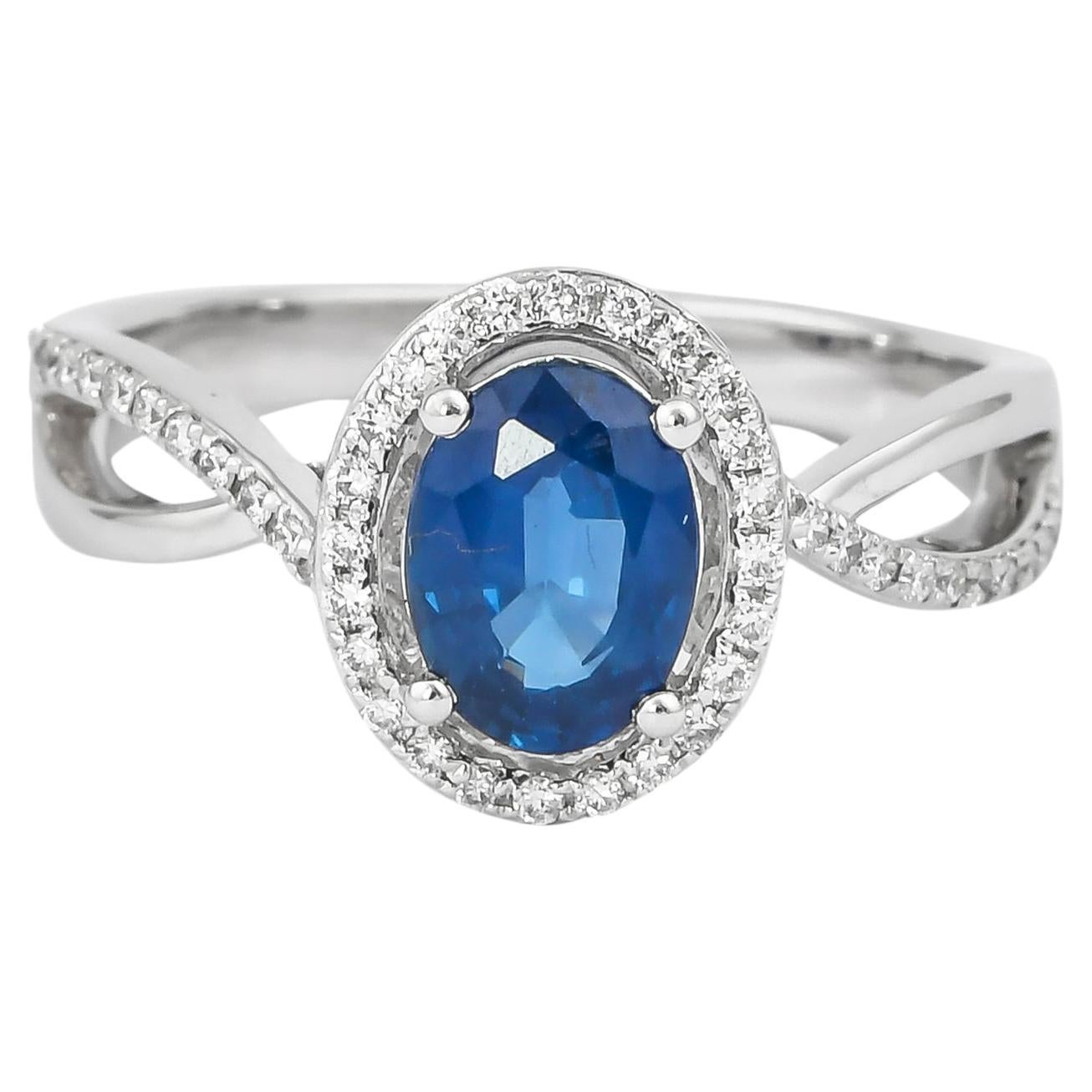 Zaffiro blu Sunita Nahata 1.28ct. Anello in 18KWG con diamante.