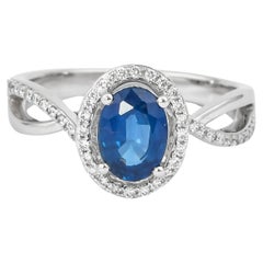 Zaffiro blu Sunita Nahata 1.28ct. Anello in 18KWG con diamante.