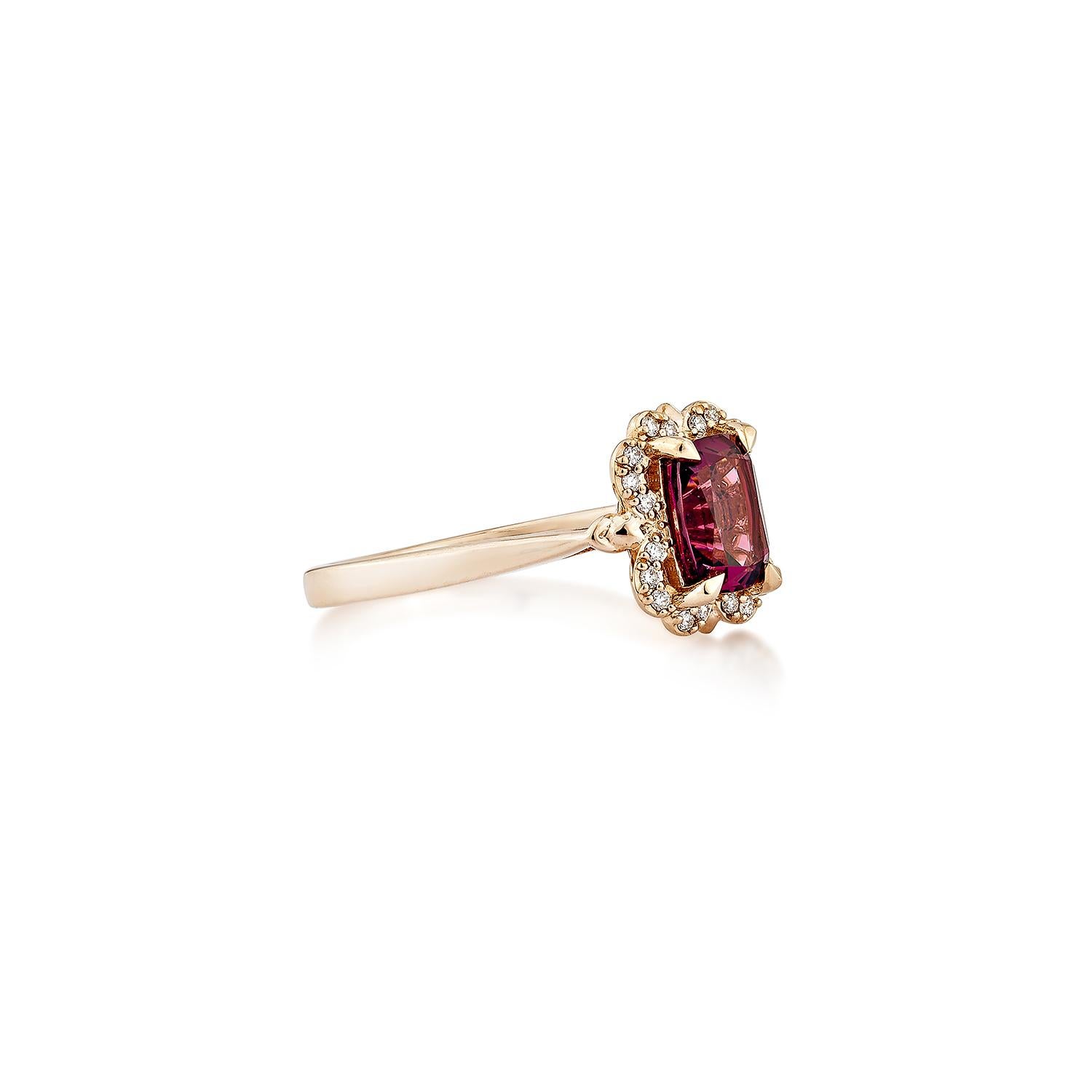 Sunita Nahata presents an elegant Rhodolite fancy ring in an cushion shape, set with sparkling white diamonds. This exquisite piece exudes grace and elegance, making it perfect for both daily wear and special occasions. Crafted from 14-karat rose