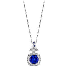 Sunita Nahata Tanzanite et saphir bleu 1.29ct. Pendentif en 18KWG avec diamant.