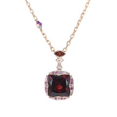 Sunita Nahata Garnet 13.32ct. Pendant in 18KRG with Gemstones & Diamond.