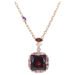 Sunita Nahata Garnet 13.32ct. Pendant in 18KRG with Gemstones & Diamond.