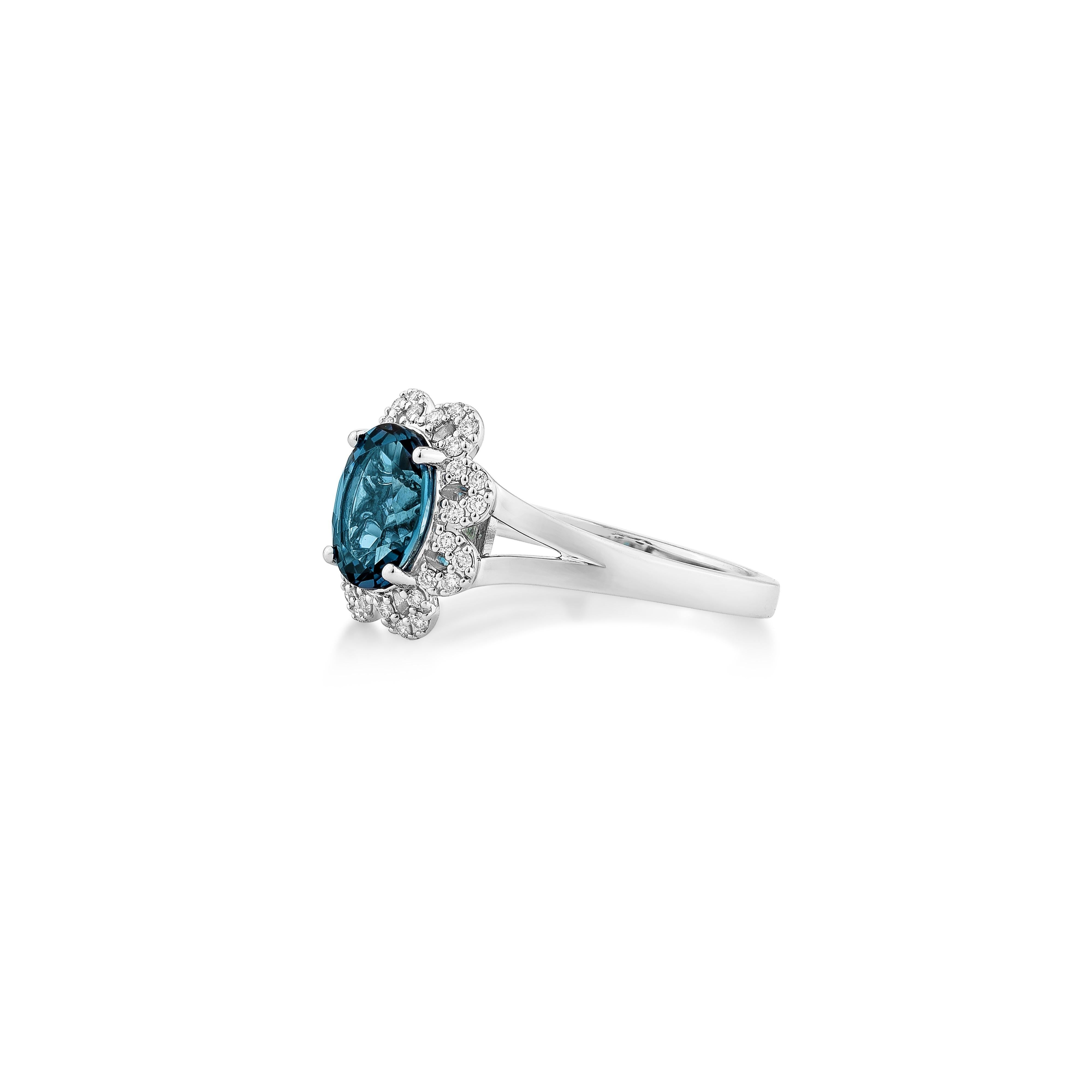 Oval Cut Sunita Nahata London Blue Topaz 1.35ct. Fancy Ring in 14KWG with Diamond. For Sale